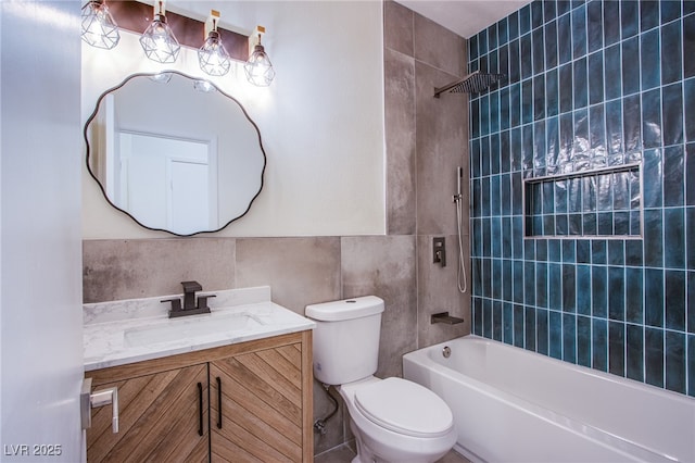 5653 Artesia Lake Ct, Las Vegas, NV 89118 - full bath with vanity, toilet, shower / tub combination, and tile walls