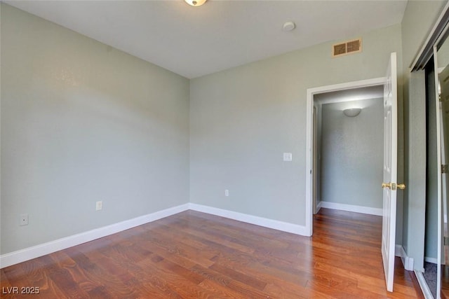 1405 S Nellis Blvd Unit 2117, Las Vegas, NV 89104 - empty room with wood finished floors and baseboards