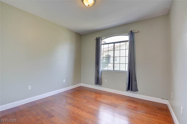 1405 S Nellis Blvd Unit 2117, Las Vegas, NV 89104 - empty room featuring wood finished floors and baseboards