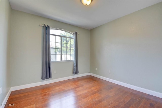 1405 S Nellis Blvd Unit 2117, Las Vegas, NV 89104 - spare room featuring wood finished floors and baseboards