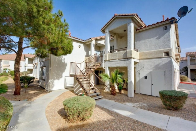 1405 S Nellis Blvd Unit 2117, Las Vegas, NV 89104 - view of building exterior featuring stairway