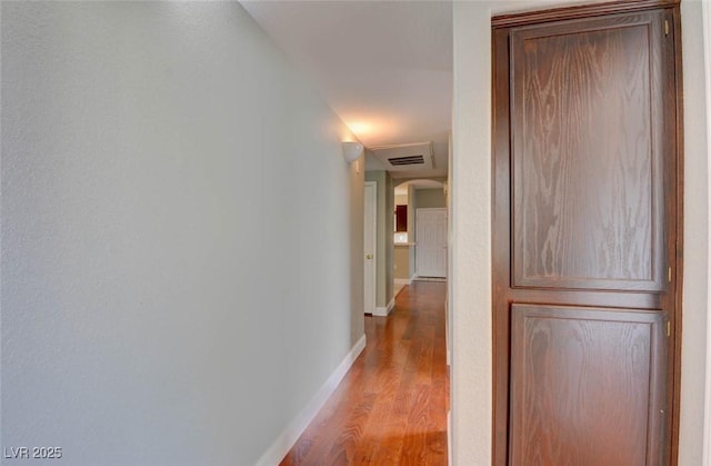 1405 S Nellis Blvd Unit 2117, Las Vegas, NV 89104 - hall with wood finished floors, baseboards, and arched walkways