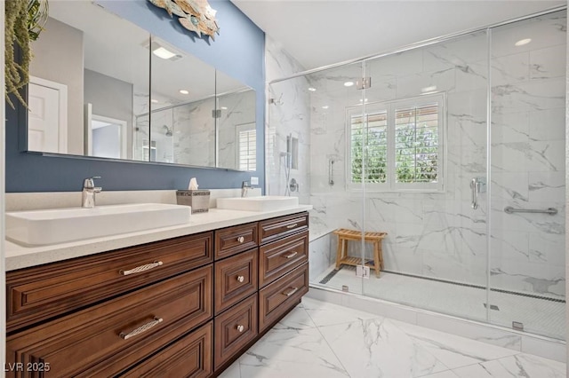 2425 Sturrock Dr, Henderson, NV 89044 - full bath with marble finish floors, double vanity, and a marble finish shower