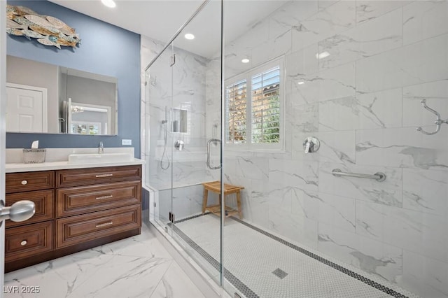 2425 Sturrock Dr, Henderson, NV 89044 - bathroom with a marble finish shower, vanity, marble finish flooring, and recessed lighting