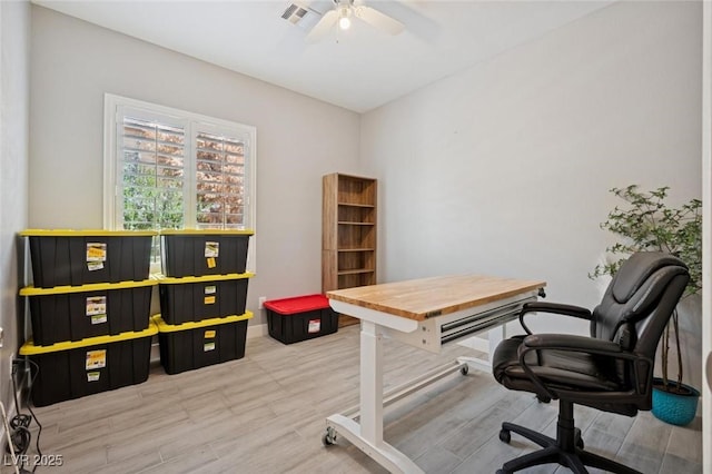 2425 Sturrock Dr, Henderson, NV 89044 - home office featuring ceiling fan, wood finished floors, and baseboards