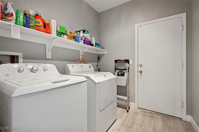2425 Sturrock Dr, Henderson, NV 89044 - washroom featuring independent washer and dryer, baseboards, and light wood-style floors