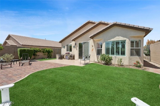 2425 Sturrock Dr, Henderson, NV 89044 - rear view of property featuring a patio and stucco siding