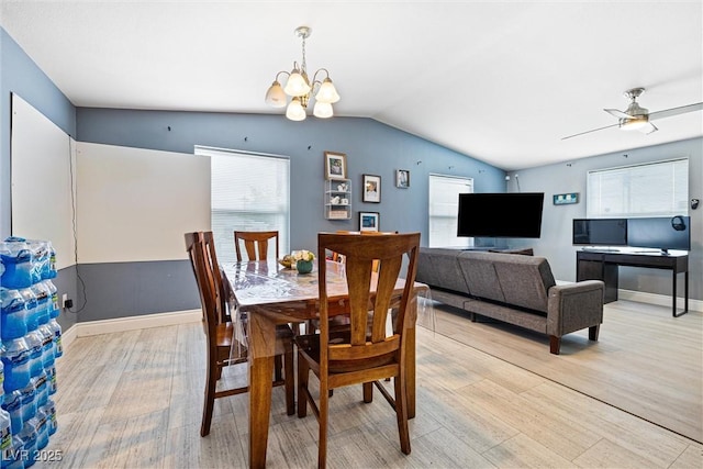 320 W Van Buren Ave, Las Vegas, NV 89106 - dining area with light wood finished floors, a chandelier, lofted ceiling, baseboards, and a ceiling fan