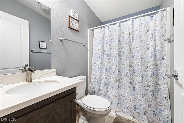 320 W Van Buren Ave, Las Vegas, NV 89106 - bathroom featuring vanity, toilet, a shower with shower curtain, and a textured wall