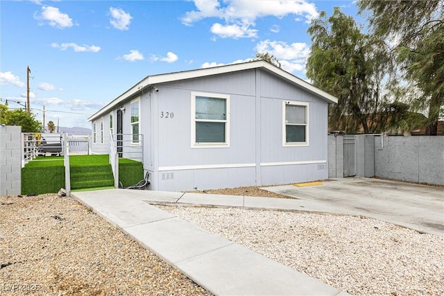 320 W Van Buren Ave, Las Vegas, NV 89106 - view of home's exterior with a patio area