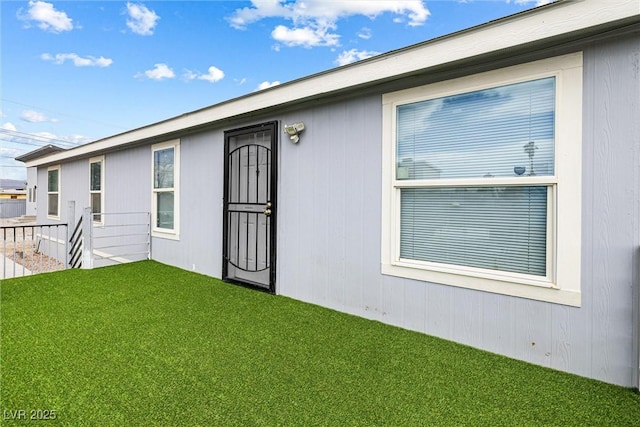 320 W Van Buren Ave, Las Vegas, NV 89106 - rear view of property with a lawn