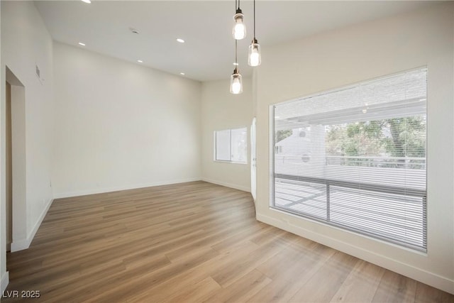 5516 Orchard Ln Unit 0, Las Vegas, NV 89110 - empty room with wood finished floors, baseboards, and recessed lighting