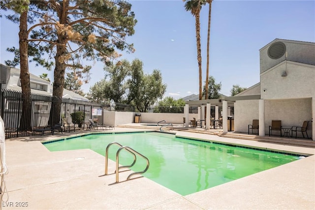 5516 Orchard Ln Unit 0, Las Vegas, NV 89110 - community pool featuring a patio