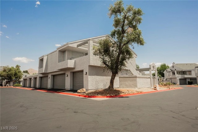 5516 Orchard Ln Unit 0, Las Vegas, NV 89110 - view of property featuring a garage