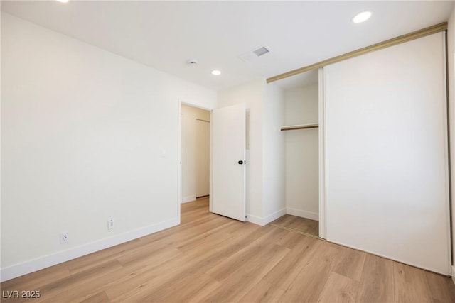 5516 Orchard Ln Unit 0, Las Vegas, NV 89110 - unfurnished bedroom featuring light wood-type flooring, recessed lighting, baseboards, and a closet