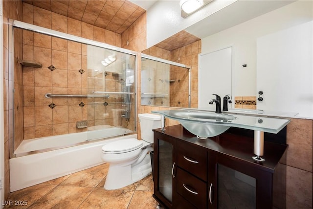 5516 Orchard Ln Unit 0, Las Vegas, NV 89110 - bathroom with vanity, shower / bath combination with glass door, and toilet