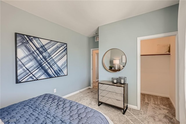 9588 Archer Peak Ct, Las Vegas, NV 89143 - bedroom with light colored carpet, baseboards, and a spacious closet