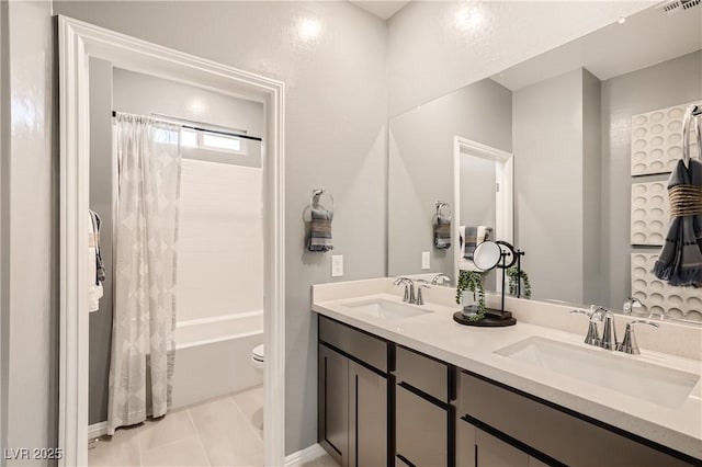 9588 Archer Peak Ct, Las Vegas, NV 89143 - full bathroom featuring double vanity, toilet, shower / tub combo with curtain, and tile patterned floors