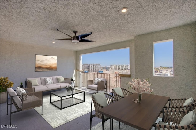 6288 Dolosonte St, Las Vegas, NV 89113 - living room featuring ceiling fan, a textured wall, plenty of natural light, a textured ceiling, and recessed lighting