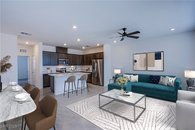 6288 Dolosonte St, Las Vegas, NV 89113 - living room with recessed lighting and ceiling fan