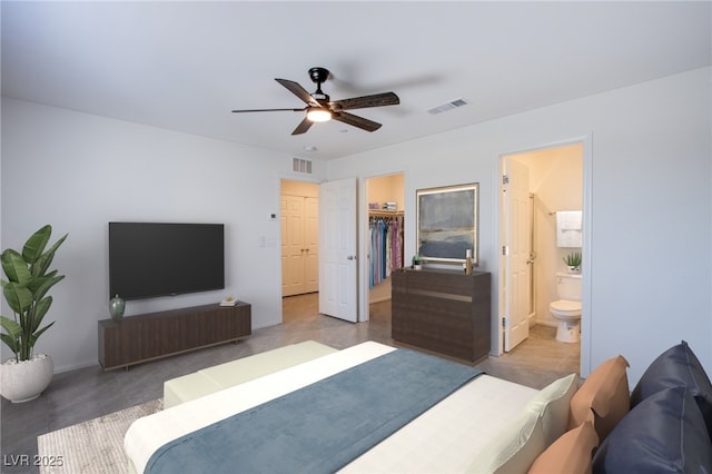 6288 Dolosonte St, Las Vegas, NV 89113 - bedroom with a walk in closet, ceiling fan, ensuite bath, and a closet