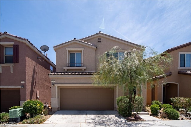 7715 Peaceful Trellis Dr, Las Vegas, NV 89179 - mediterranean / spanish-style home with a tiled roof, an attached garage, stucco siding, and concrete driveway