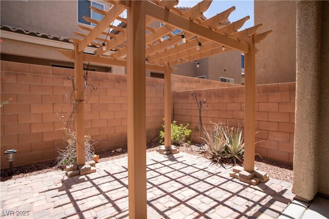 7715 Peaceful Trellis Dr, Las Vegas, NV 89179 - fenced backyard featuring a patio and a pergola