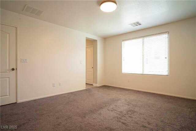 7715 Peaceful Trellis Dr, Las Vegas, NV 89179 - carpeted spare room with baseboards