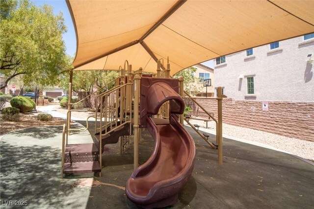 7715 Peaceful Trellis Dr, Las Vegas, NV 89179 - view of patio / terrace featuring a playground