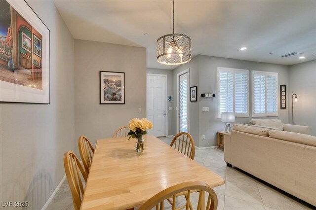 2870 Turnstone Ridge St, Henderson, NV 89044 - dining area with a chandelier, light tile patterned floors, baseboards, and recessed lighting