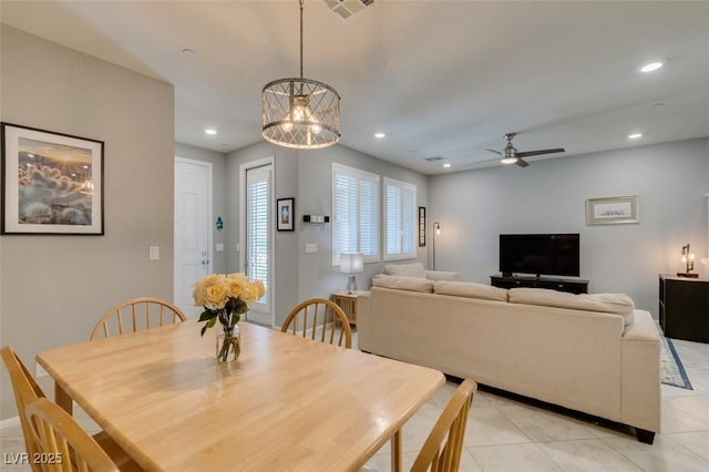 2870 Turnstone Ridge St, Henderson, NV 89044 - dining area with light tile patterned flooring, ceiling fan, recessed lighting, and a chandelier