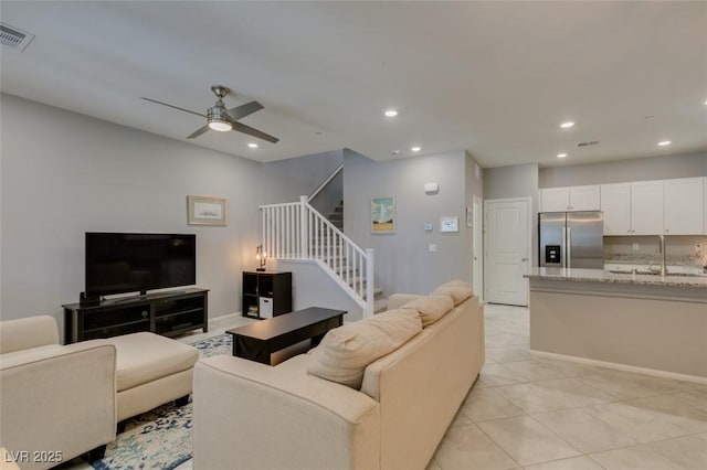2870 Turnstone Ridge St, Henderson, NV 89044 - living room with stairway, recessed lighting, a ceiling fan, and light tile patterned floors
