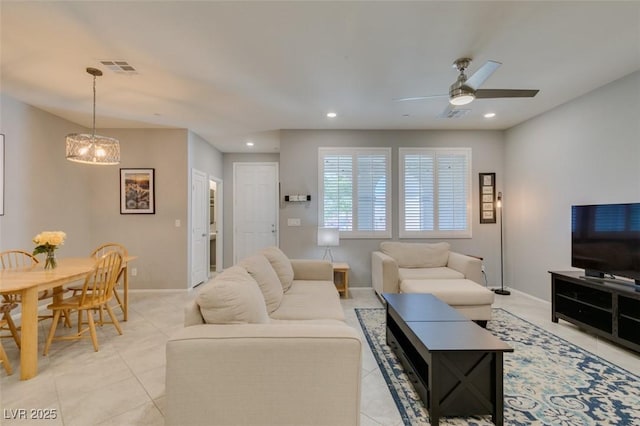 2870 Turnstone Ridge St, Henderson, NV 89044 - living area with a ceiling fan, light tile patterned floors, recessed lighting, baseboards, and a chandelier