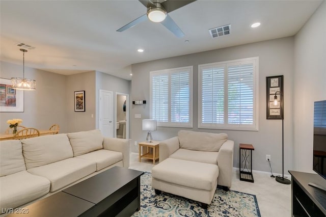 2870 Turnstone Ridge St, Henderson, NV 89044 - living area with a ceiling fan, a chandelier, recessed lighting, and baseboards