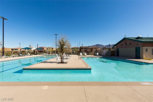 2870 Turnstone Ridge St, Henderson, NV 89044 - community pool with a residential view and a patio