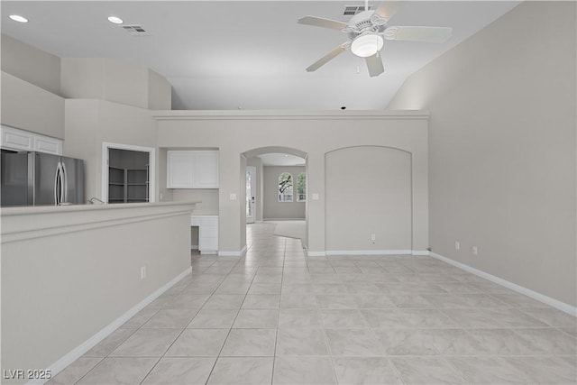 2158 Shubert Ave, Henderson, NV 89052 - unfurnished room with arched walkways, a ceiling fan, high vaulted ceiling, recessed lighting, and baseboards