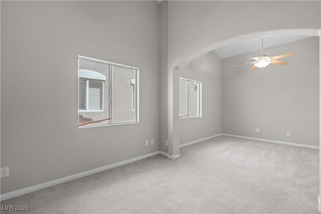 2158 Shubert Ave, Henderson, NV 89052 - carpeted spare room with arched walkways, ceiling fan, and baseboards