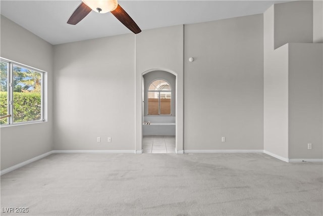 2158 Shubert Ave, Henderson, NV 89052 - carpeted spare room featuring ceiling fan, healthy amount of natural light, and baseboards