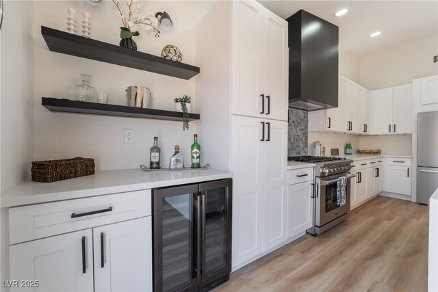 9705 Standard Ave, Las Vegas, NV 89129 - kitchen with beverage cooler, stainless steel appliances, open shelves, exhaust hood, and white cabinets
