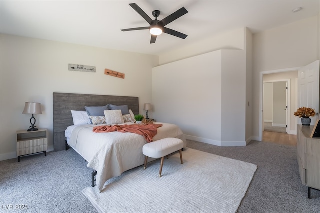 9705 Standard Ave, Las Vegas, NV 89129 - carpeted bedroom with ceiling fan and baseboards
