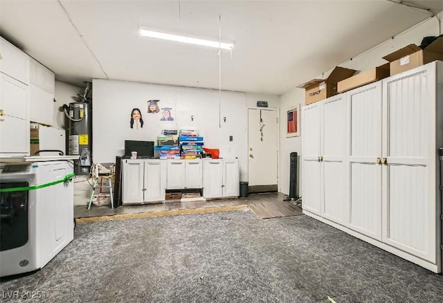 3473 Conough Ln, Las Vegas, NV 89129 - garage featuring water heater and washer / dryer