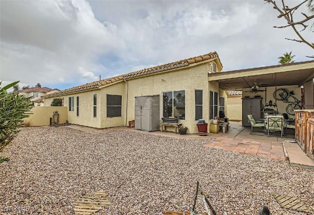 3473 Conough Ln, Las Vegas, NV 89129 - back of house featuring ceiling fan, stucco siding, a patio, and a tile roof