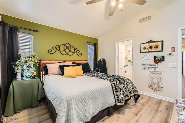 3473 Conough Ln, Las Vegas, NV 89129 - bedroom featuring wood finished floors, vaulted ceiling, baseboards, a ceiling fan, and connected bathroom
