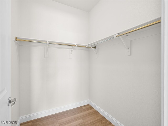 5120 Mirage Garden St, Las Vegas, NV 89130 - spacious closet featuring light wood finished floors