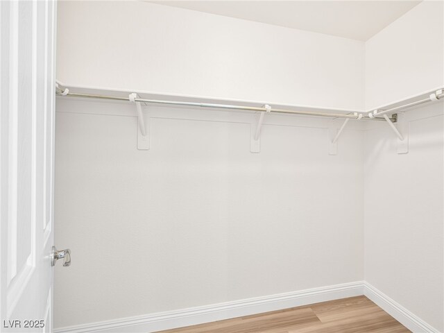 5120 Mirage Garden St, Las Vegas, NV 89130 - spacious closet featuring light wood-type flooring
