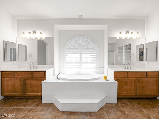 5120 Mirage Garden St, Las Vegas, NV 89130 - full bathroom with a bath, two vanities, and a shower stall