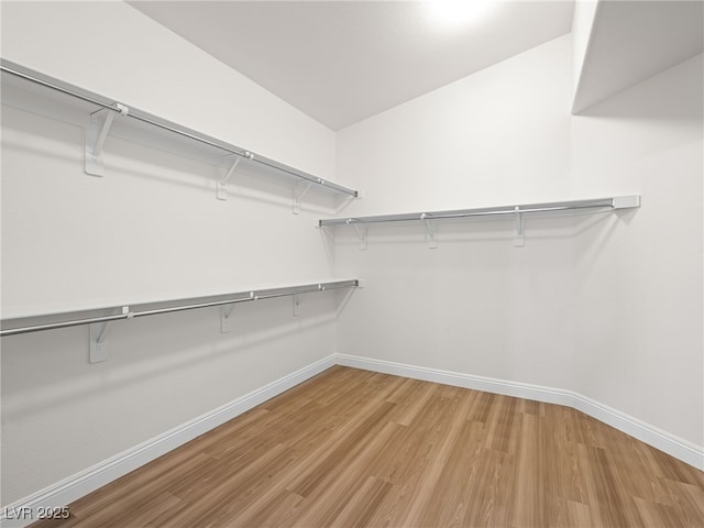 5120 Mirage Garden St, Las Vegas, NV 89130 - spacious closet featuring light wood-type flooring