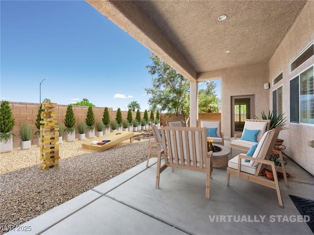 5120 Mirage Garden St, Las Vegas, NV 89130 - fenced backyard with a patio and an outdoor living space