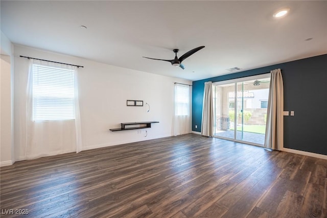 871 Aurelie Ridge St, Henderson, NV 89011 - empty room with dark wood-style flooring, a ceiling fan, and baseboards
