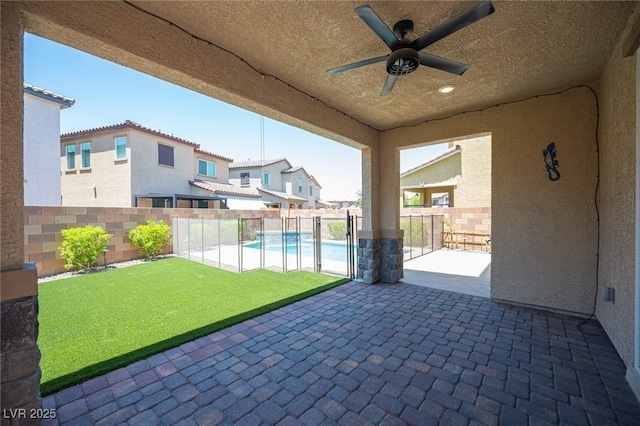 871 Aurelie Ridge St, Henderson, NV 89011 - fenced backyard featuring ceiling fan and a patio area